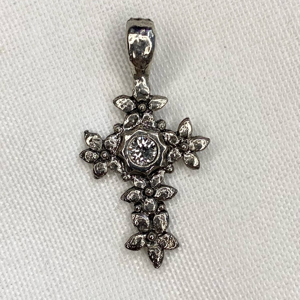 Silver plated cross with crystal in the middle